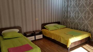 Фото номера Семейный номер с видом на горы Отель Hotel Kvariati Nugo г. Квариати 3