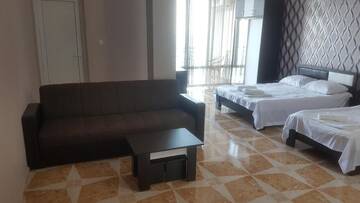 Фото номера Четырехместный номер &quot;Комфорт&quot; Отель Hotel Kvariati Nugo г. Квариати 8
