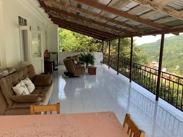 Фото номера Апартаменты с террасой Гостевой дом Guest House Family г. Квариати 8