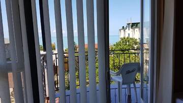 Фото номера Семейный номер с видом на море Отель Hotel Del Mar г. Квариати 2