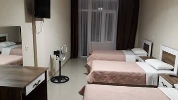 Фото номера Четырехместный номер Гостевой дом Goga1 Guest House г. Квариати 3
