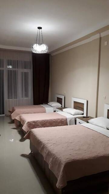 Фото номера Четырехместный номер Гостевой дом Goga1 Guest House г. Квариати 4