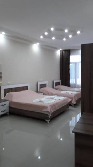 Фото номера Четырехместный номер с балконом Гостевой дом Goga1 Guest House г. Квариати 5