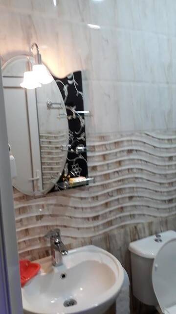 Фото номера Четырехместный номер с балконом Гостевой дом Goga1 Guest House г. Квариати 8