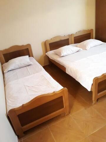 Фото номера Четырехместный номер с ванной Гостевой дом Guesthouse Gio555 г. Квариати 2