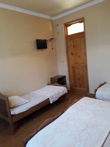 Фото номера Четырехместный номер с ванной Гостевой дом Guesthouse Gio555 г. Квариати 3