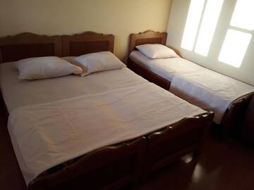 Фото номера Трехместный номер с ванной Гостевой дом Guesthouse Gio555 г. Квариати 2